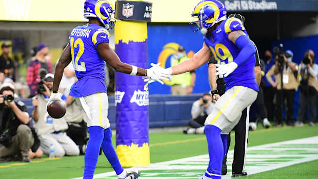 Dec 5, 2021; Inglewood, California, USA; /Los Angeles Rams wide receiver Van Jefferson (12) celebrates with tight end Tyler Higbee (89) his touchdown scored against the Jacksonville Jaguars during the second half at SoFi Stadium. Mandatory Credit: Gary A. Vasquez-USA TODAY Sports